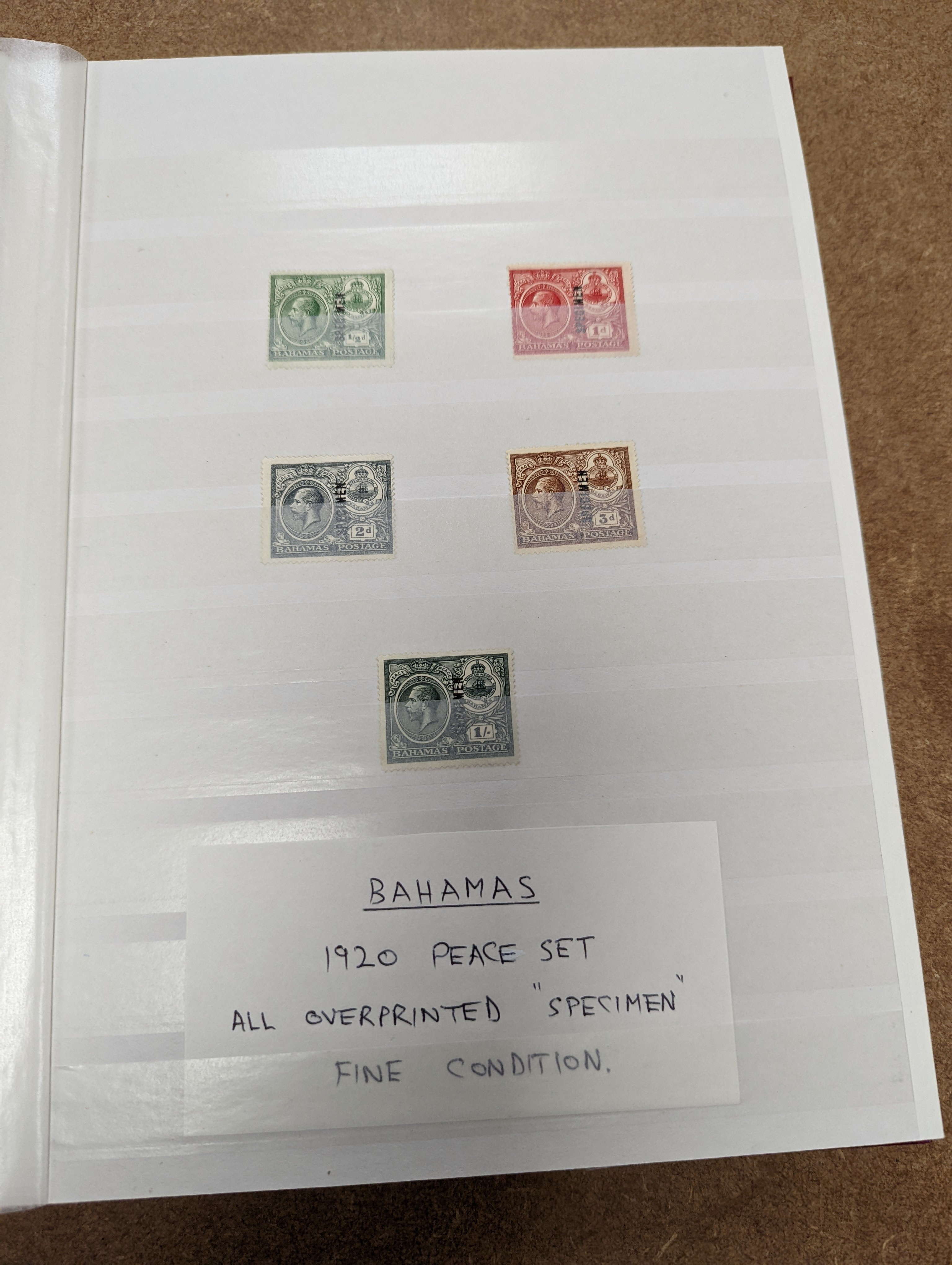 British Commonwealth stamps in stock book with Ascension 1922 set overprinted specimen, 1924 set mint, Bahamas, Barbados Britannia Heads, Cyprus 1928 anniversary set- £1 mint, Falkland 1s. 1878 1d claret mint (and certif
